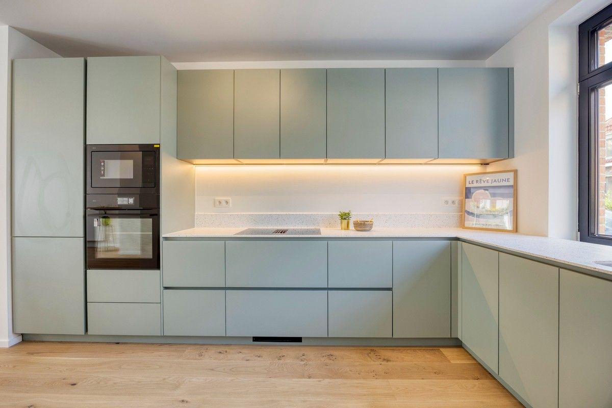 Aantrekkelijke gerenoveerde interbellum burgerwoning met vijf slaapkamers en stadstuin. foto 10