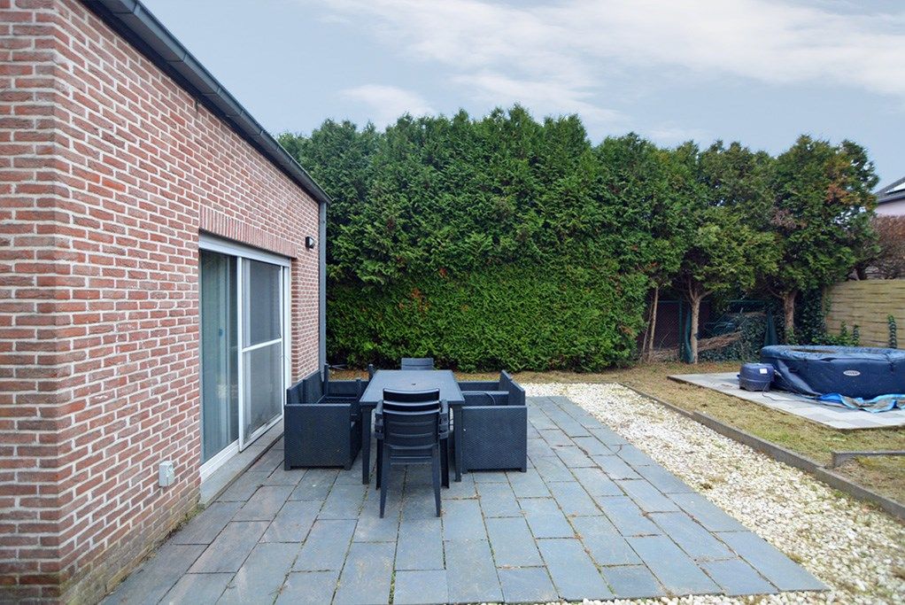 Vrijstaande woning op 5 a 87 ca met 3 ruime slpk. en inpandige garage. foto 19