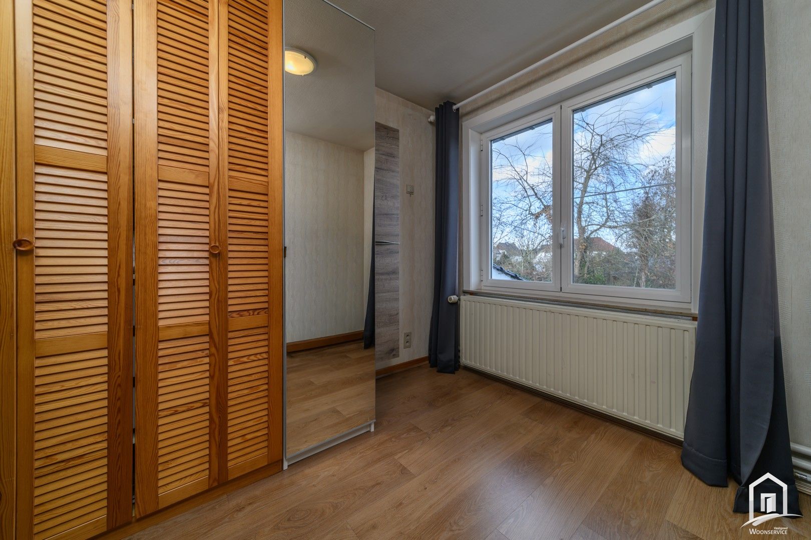 Instapklare halfopen bebouwing met tuin en garages in Denderleeuw foto 31