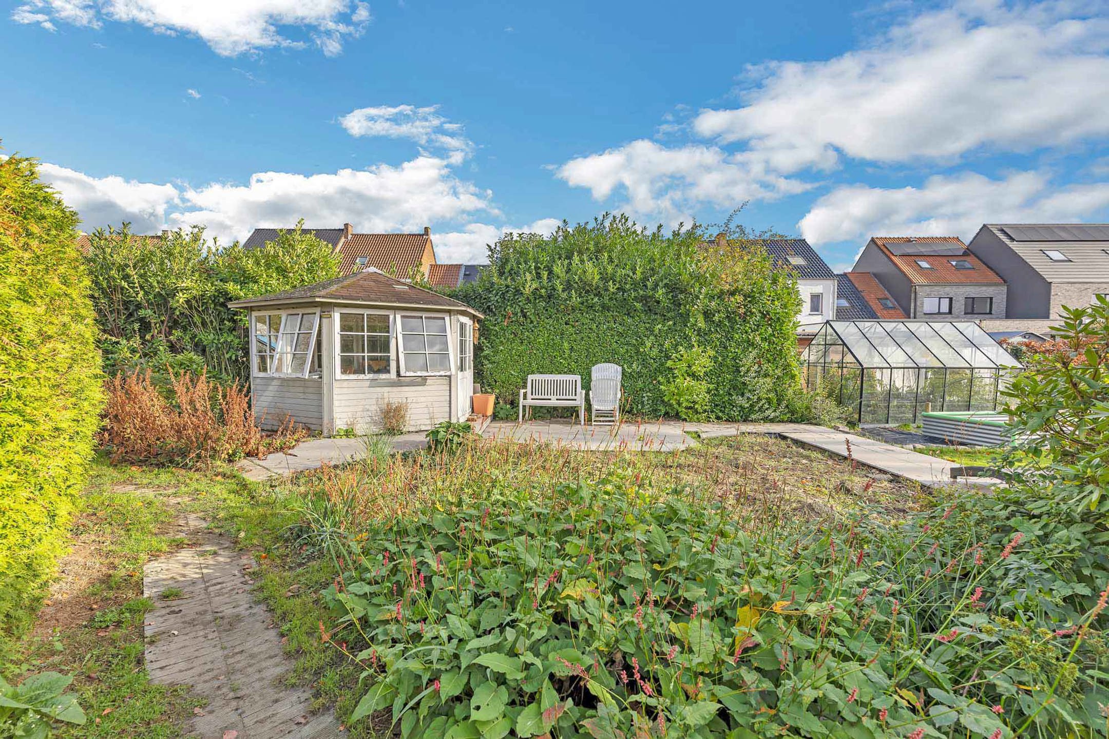 Gezellige woning met ruime tuin foto 28