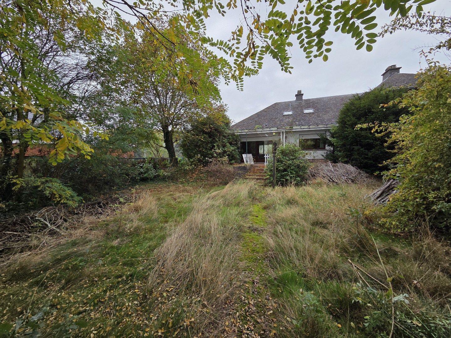 Ruime te renoveren woning met aanpalende gronden voor een totale oppervlakte van 12860 m²! foto 27