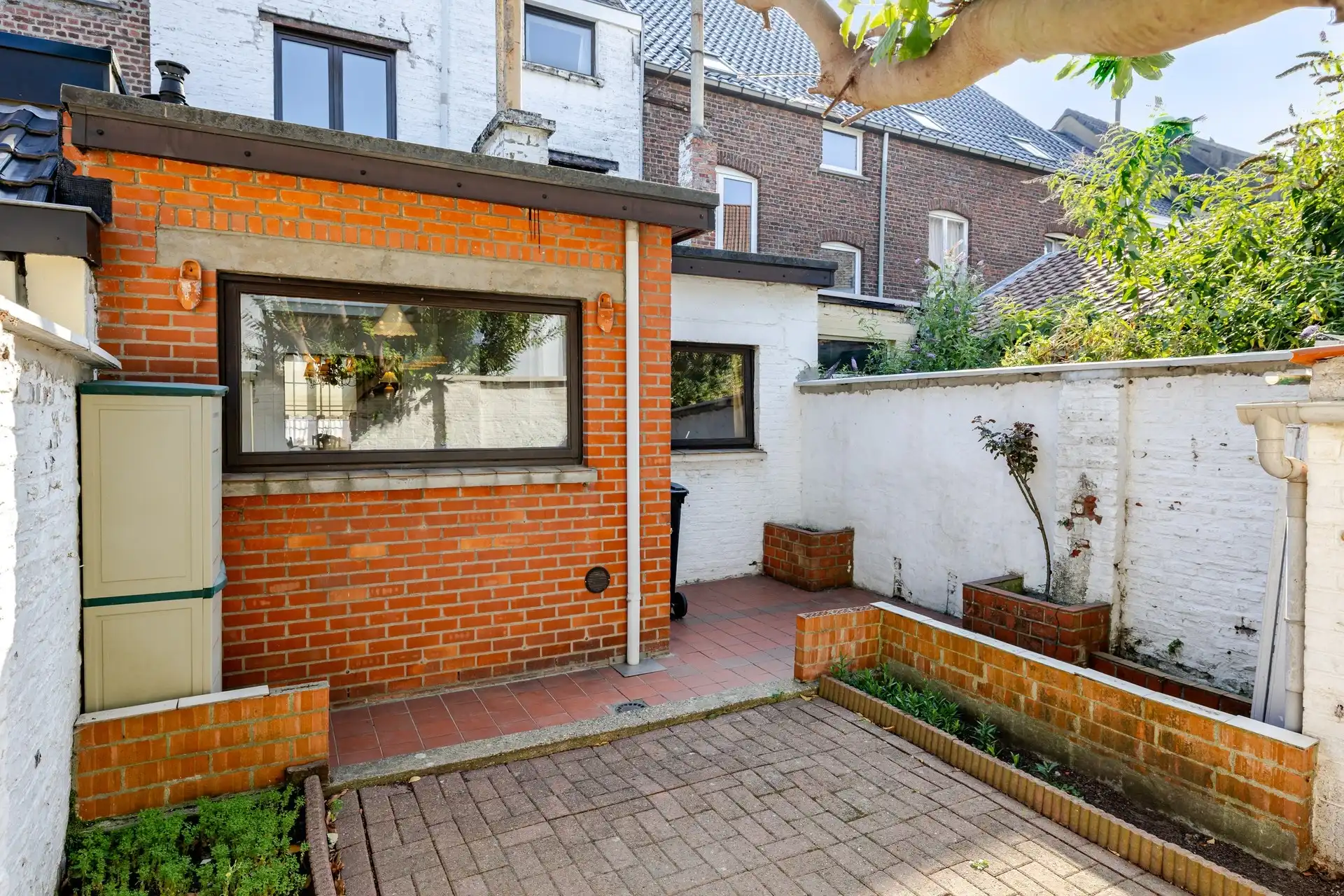 Ruime stadswoning met zonnige tuin op topligging aan het Stadspark van Aalst foto 15