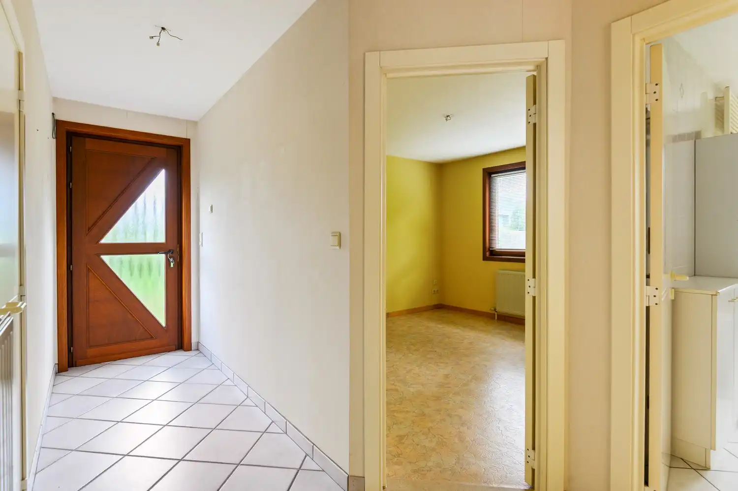Vrijstaande laagbouwwoning met zonnige tuin en uitbreidingsmogelijkheden in Oelegem! foto 2