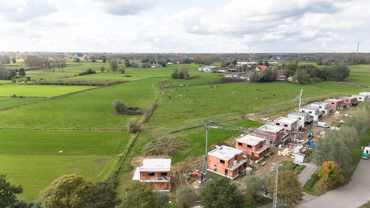 Energiezuinige open bebouwing met zicht op de velden foto 4