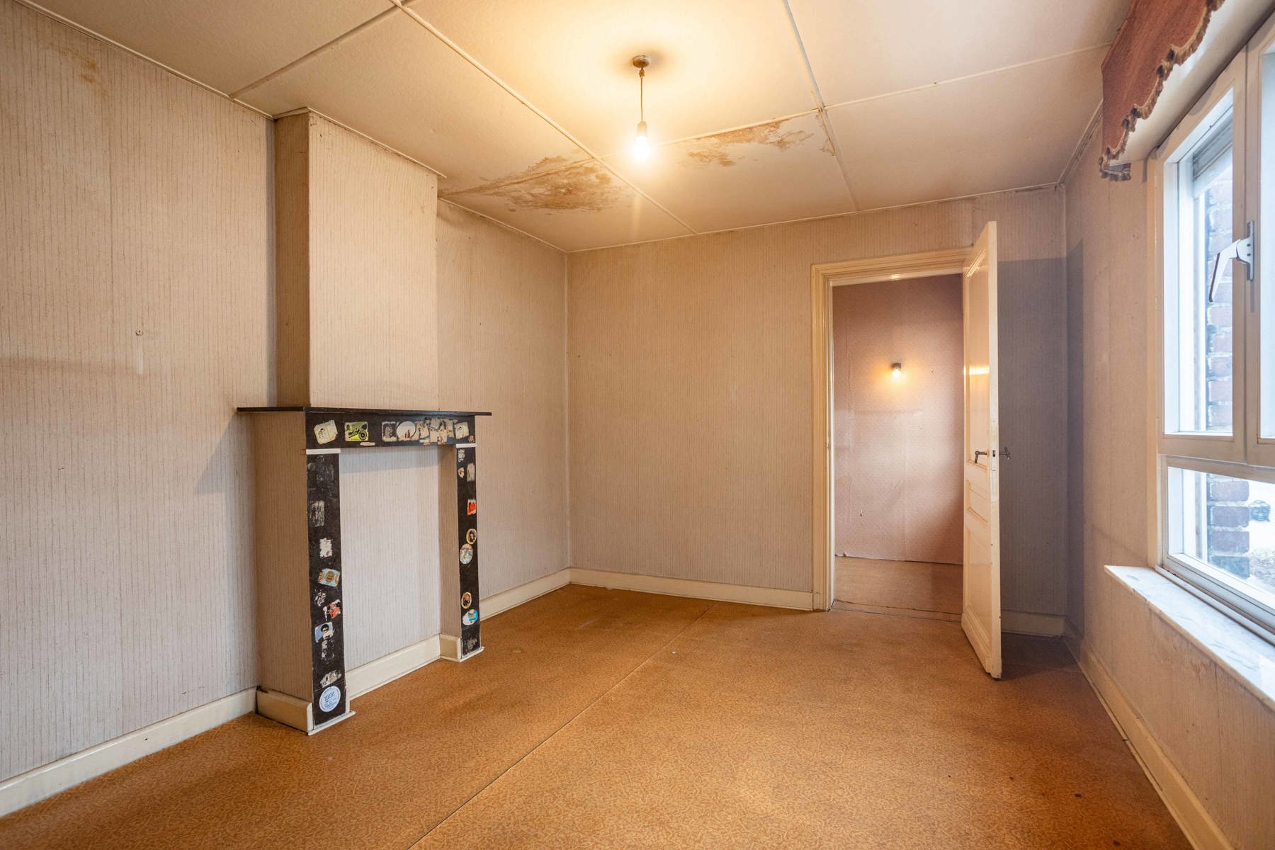 TE RENOVEREN RIJWONING MET TUIN EN GARAGEBOXEN foto 17