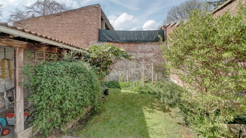 Ruime herenwoning met mogelijkheid praktijkruimte op 1 are 79 ca met stadstuintje foto 3