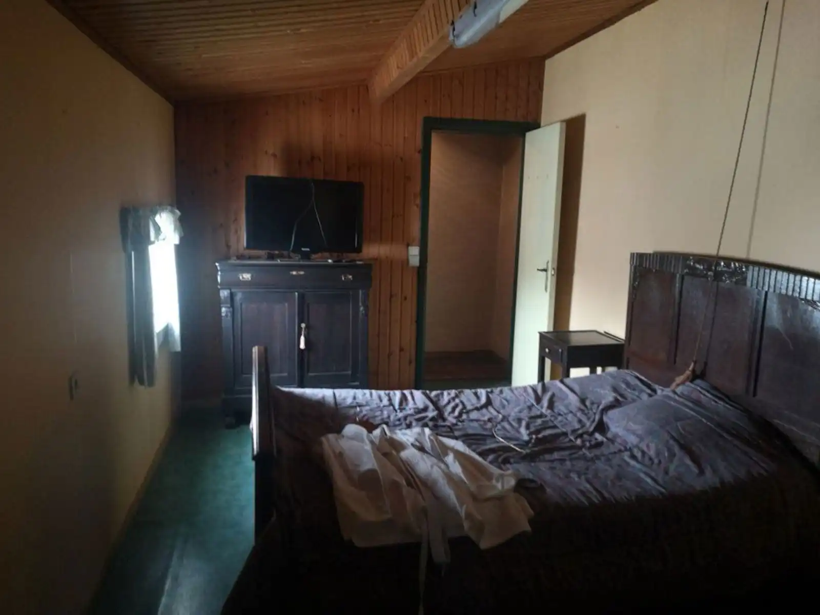 Te renoveren halfopen woning met grote naastliggende tuin foto 6