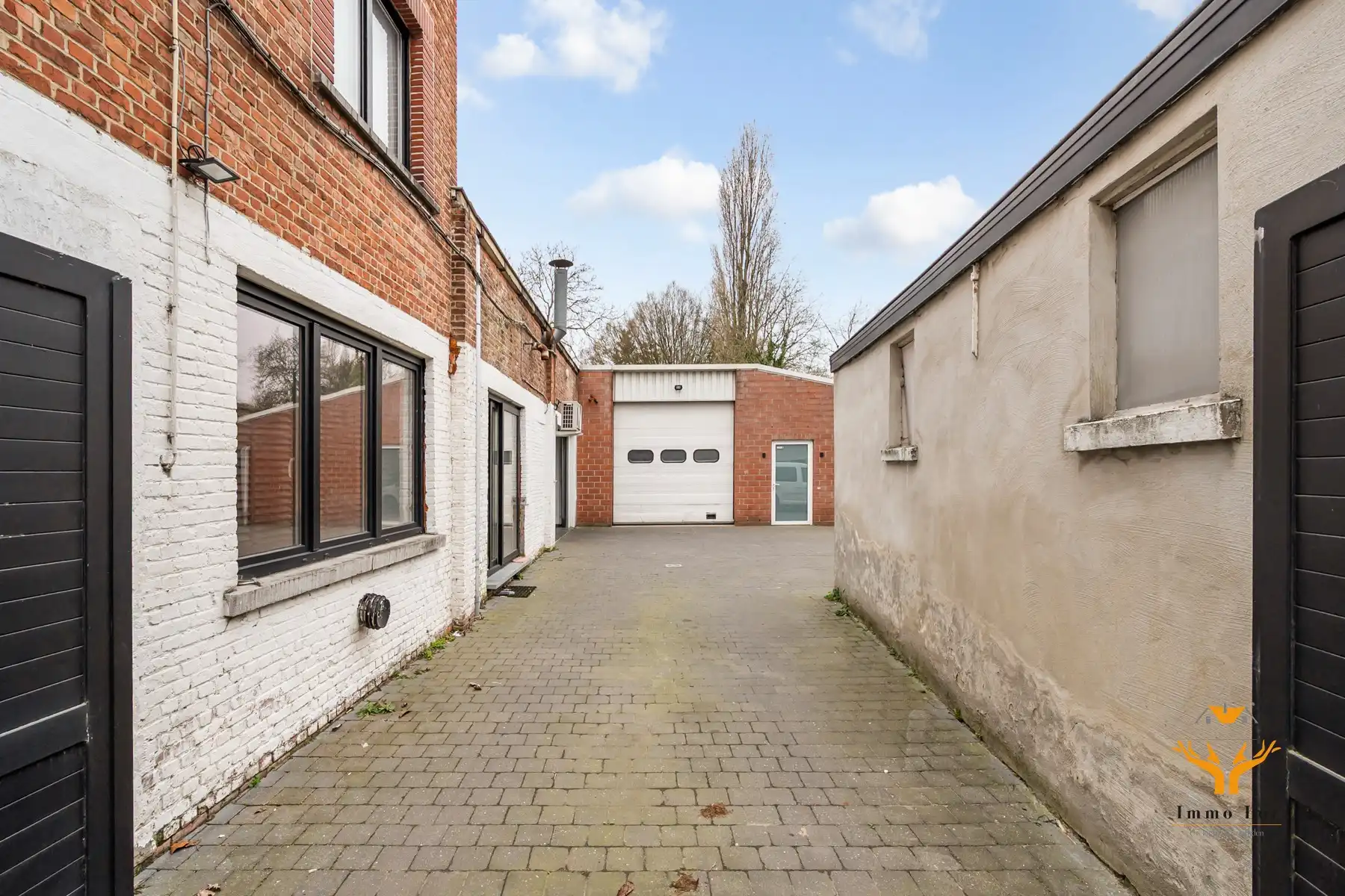 Woning met toonzaal, magazijn en garages te Hamme foto 22