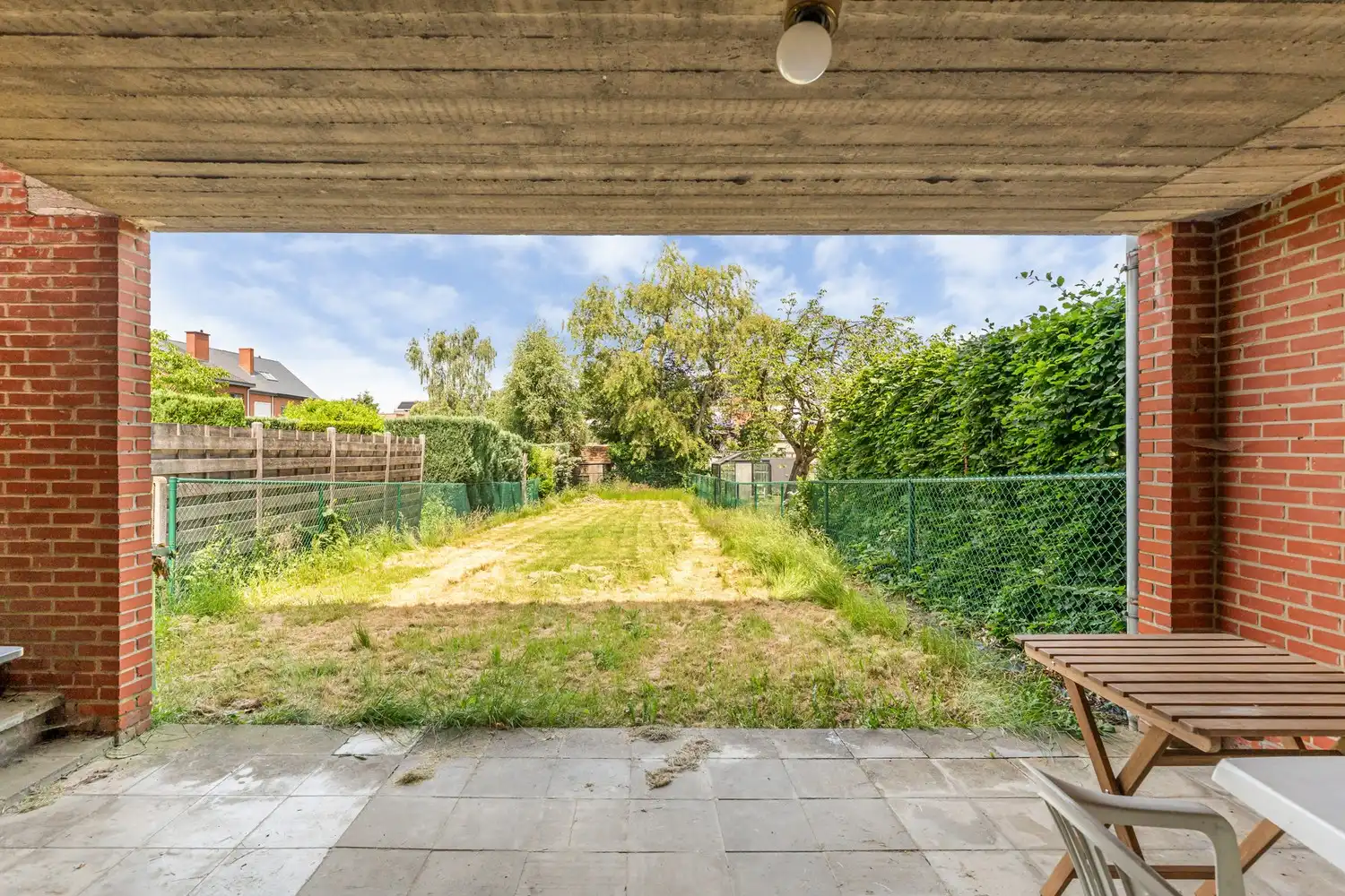 Gerenoveerde en energiezuinige woning met 3 slaapkamers, een diepe tuin en een garage met een oprit op een toplocatie te Kessel-Lo! foto 6