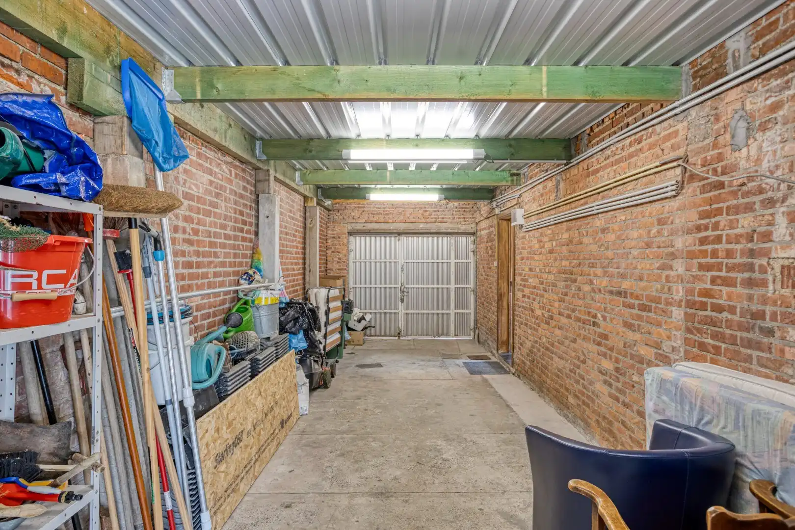 Woning met diepe tuin, garage en vernieuwd geïsoleerd dak, centrum Borgloon foto 23