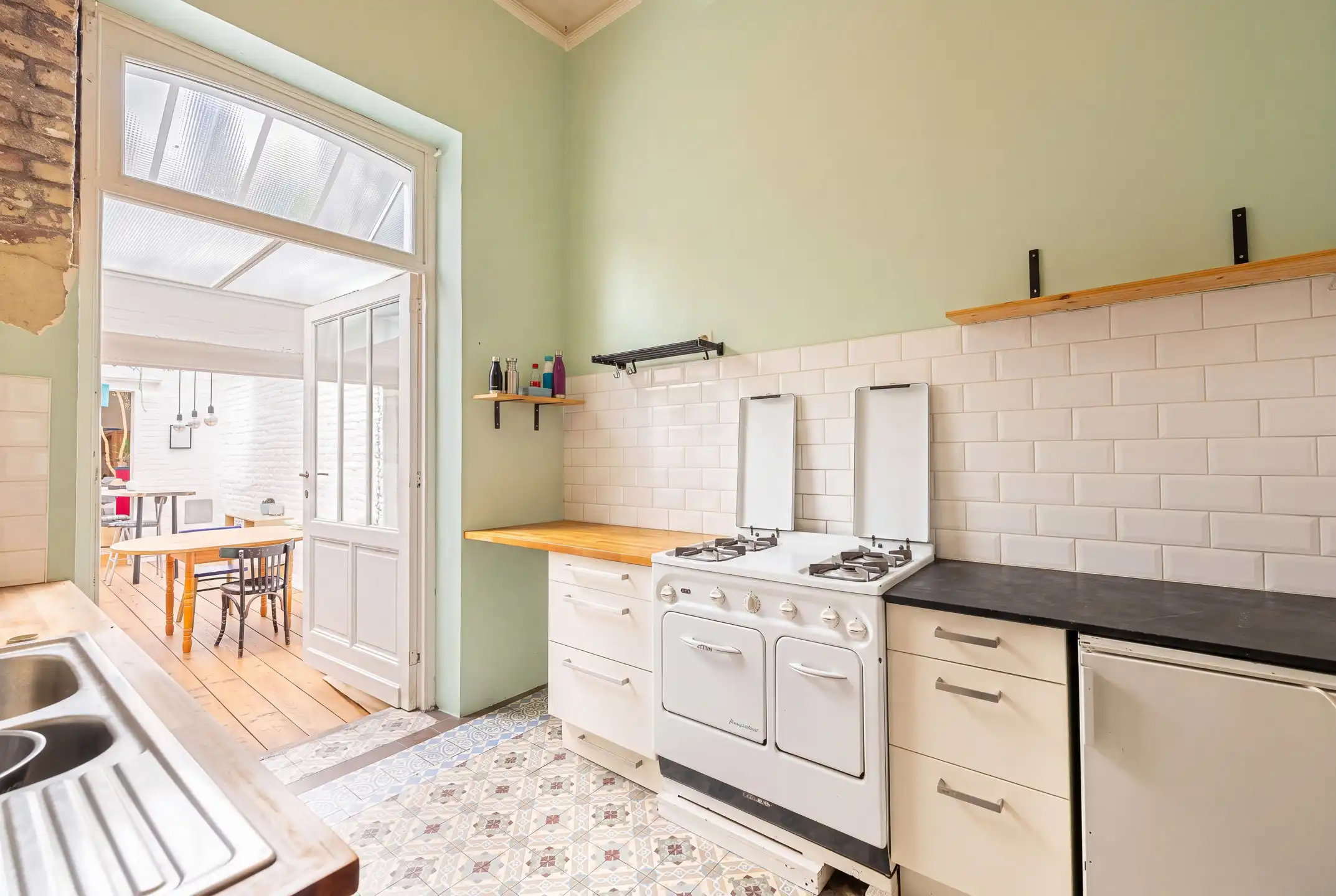 Begane grond 2 slaapkamers van ± 126 m² met tuin foto 8