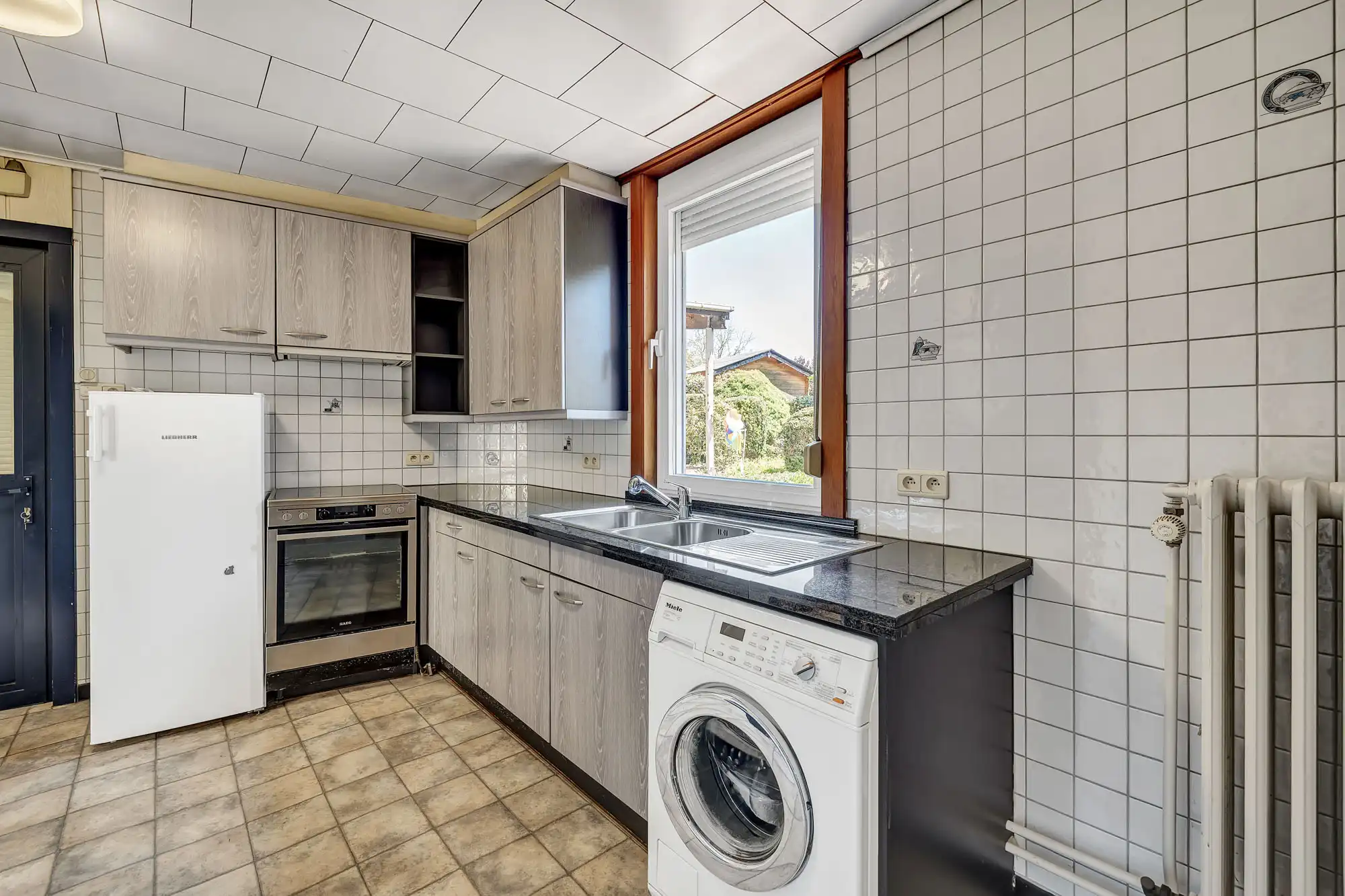 Te renoveren ruime handelswoning foto 10