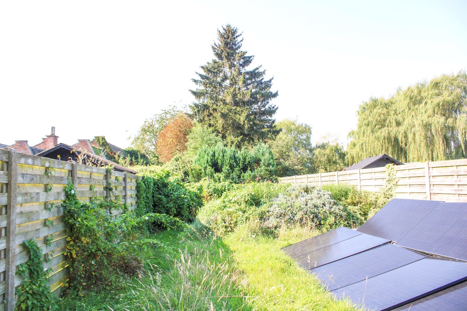 Unieke en ruime woning met vijf slaapkamers, tuin én garage te koop in het hart van Sint-Niklaas! foto 5