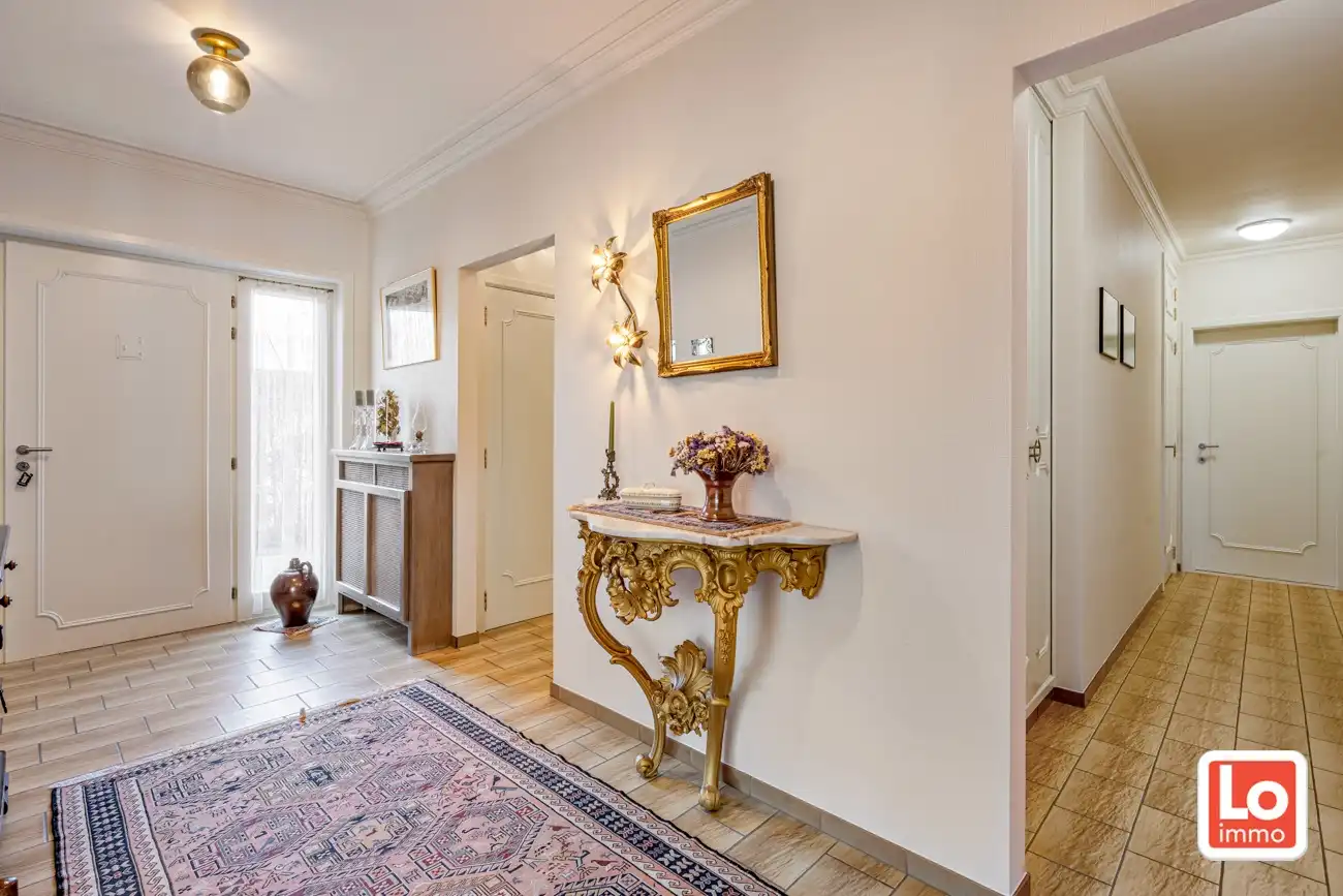 Degelijke open gelijkvloerse woning met inpandige garage en grote tuin op een groene toplocatie in Beervelde! foto 9