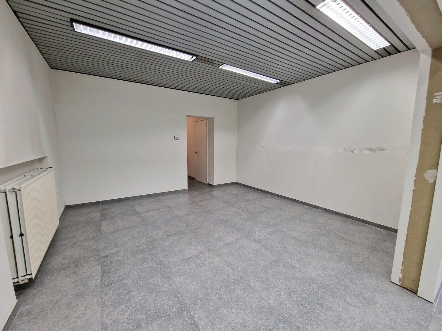 MODERNE WINKELRUIMTE VAN 129 M² IN CENTRUM IEPER foto 9