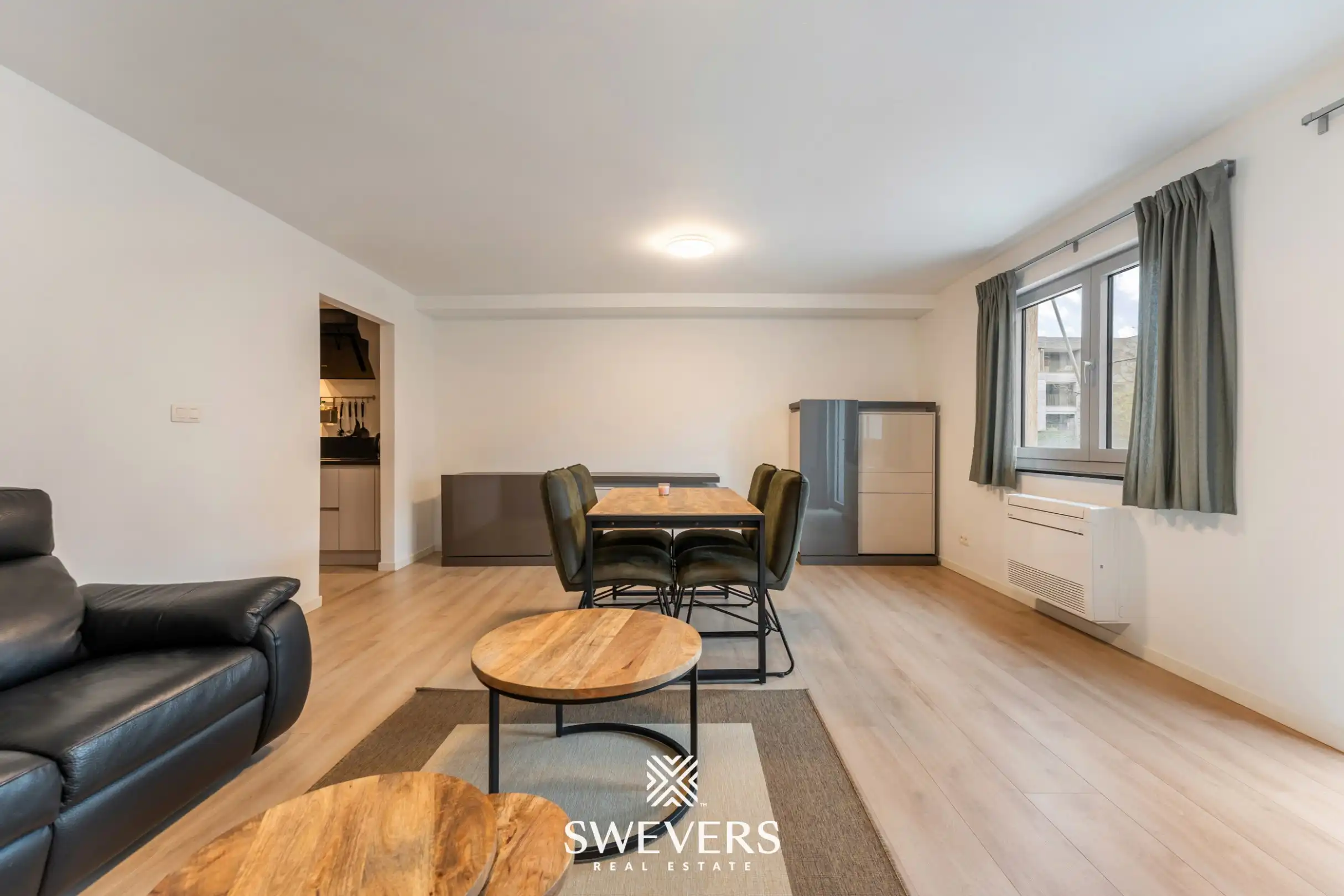 Modern en instapklaar appartement in hartje Genk met uitstekende investeringsopportuniteit foto 2