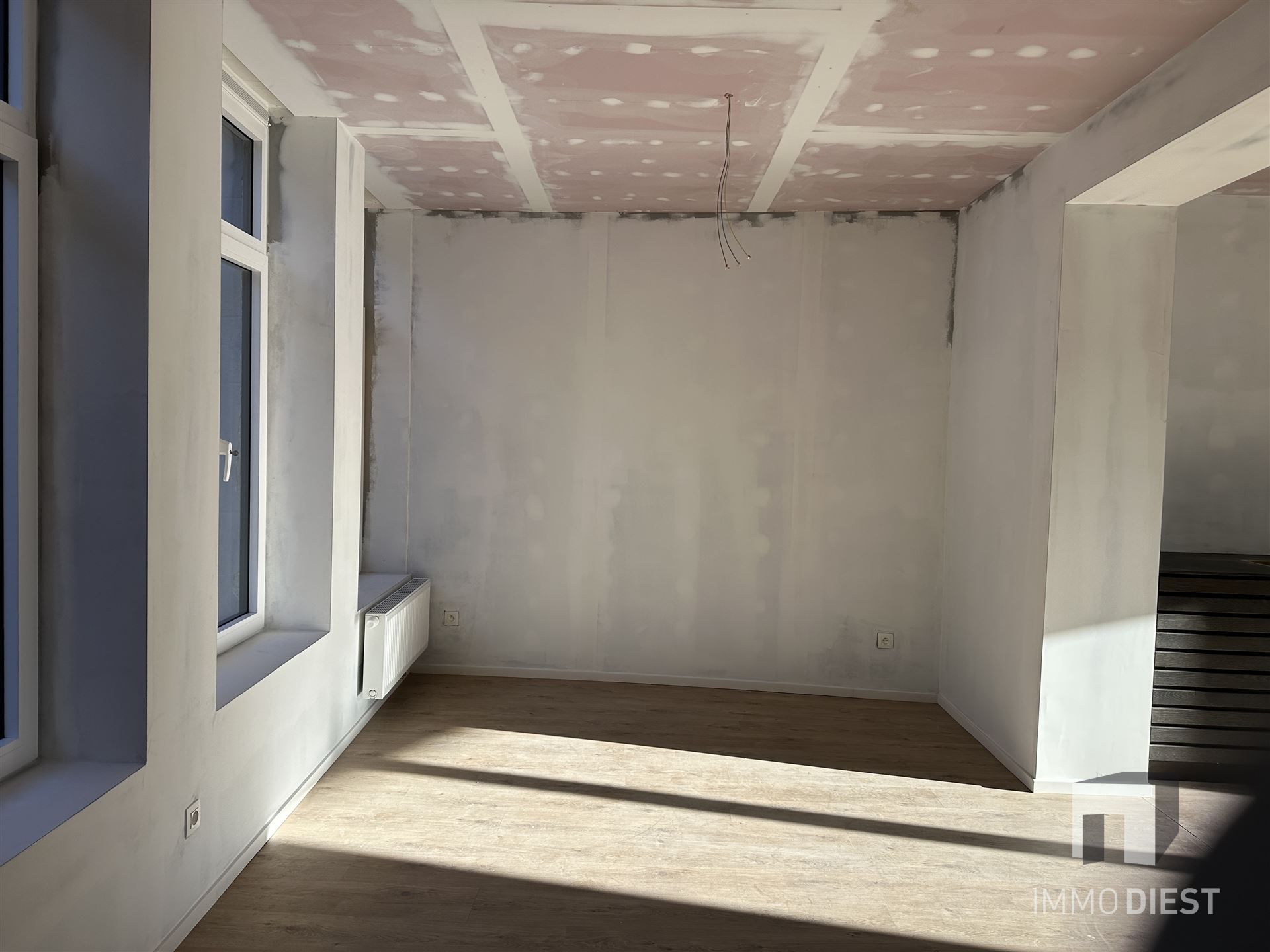 Opbrengsteigendom - 3 gloednieuwe appartementen + 1 handelspand foto 10