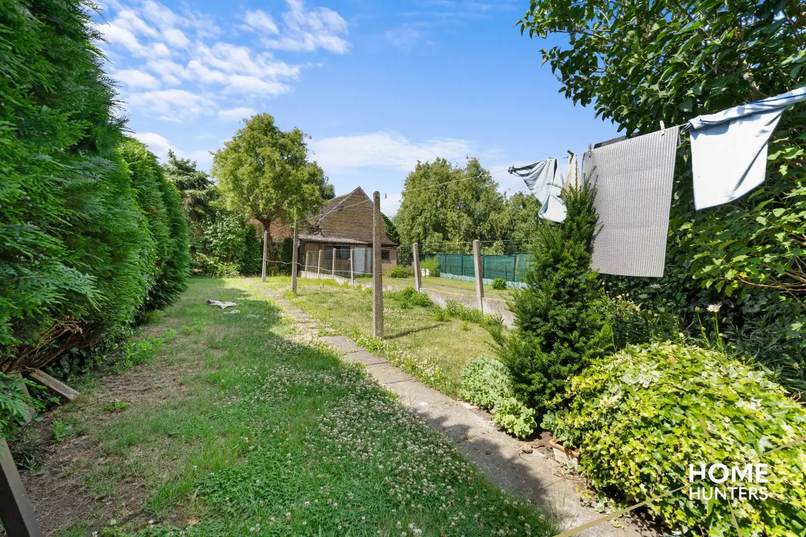 Ruime woning op een uitstekende locatie met 4 slaapkamers, een ruime zolder en een mogelijkheid om een garage te plaatsen foto 13