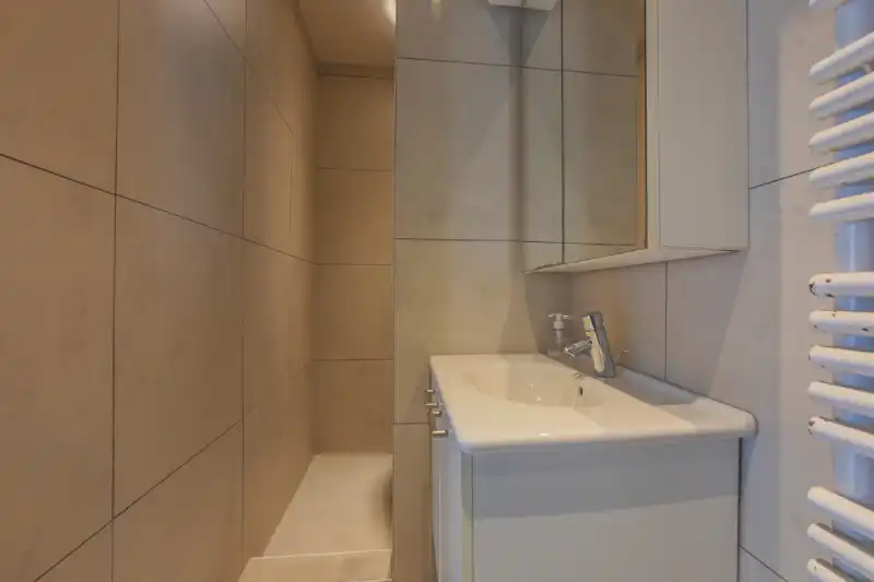 Handelspand (winkel) met woonst en magazijntje van +/- 130m². foto 2