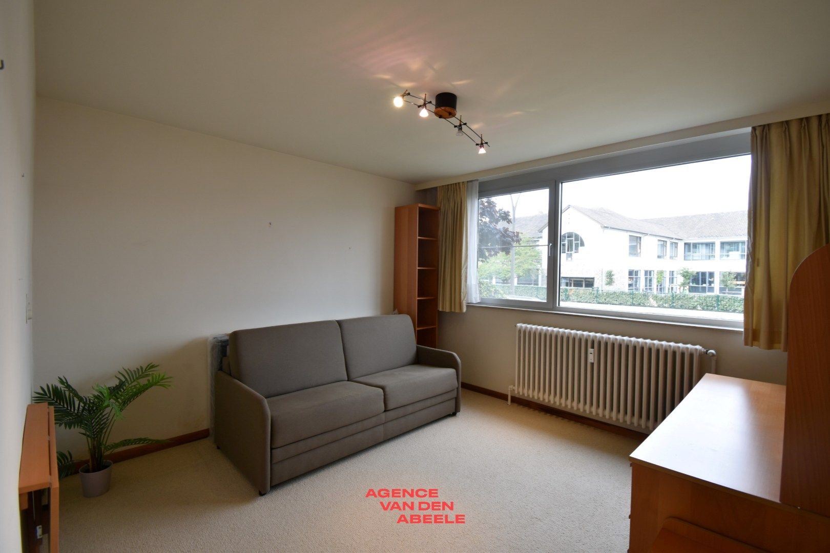 Stijlvol gelijkvloers appartement met royaal terras en boszicht foto 12