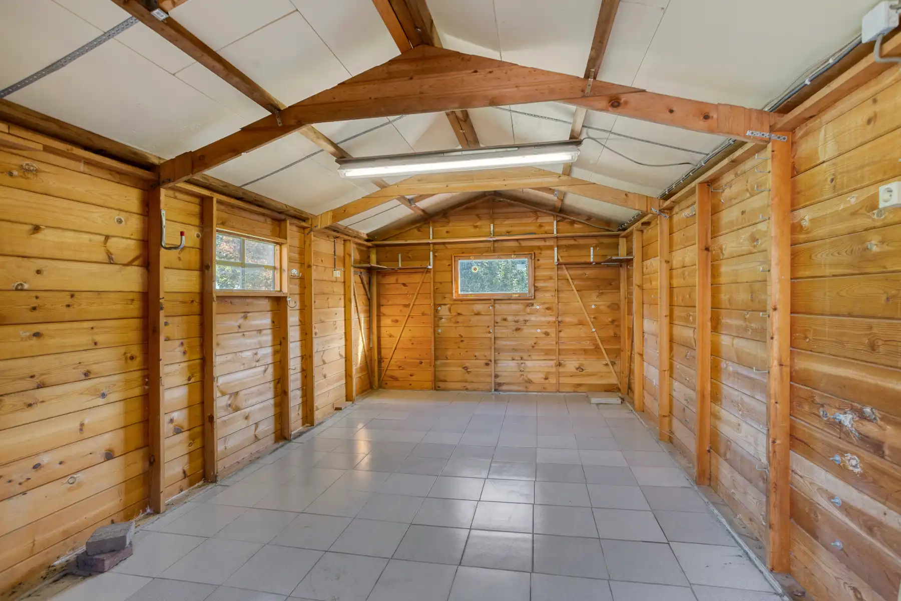 Half open bebouwing met 3 slaapkamers, garage en ruime tuin! foto 19