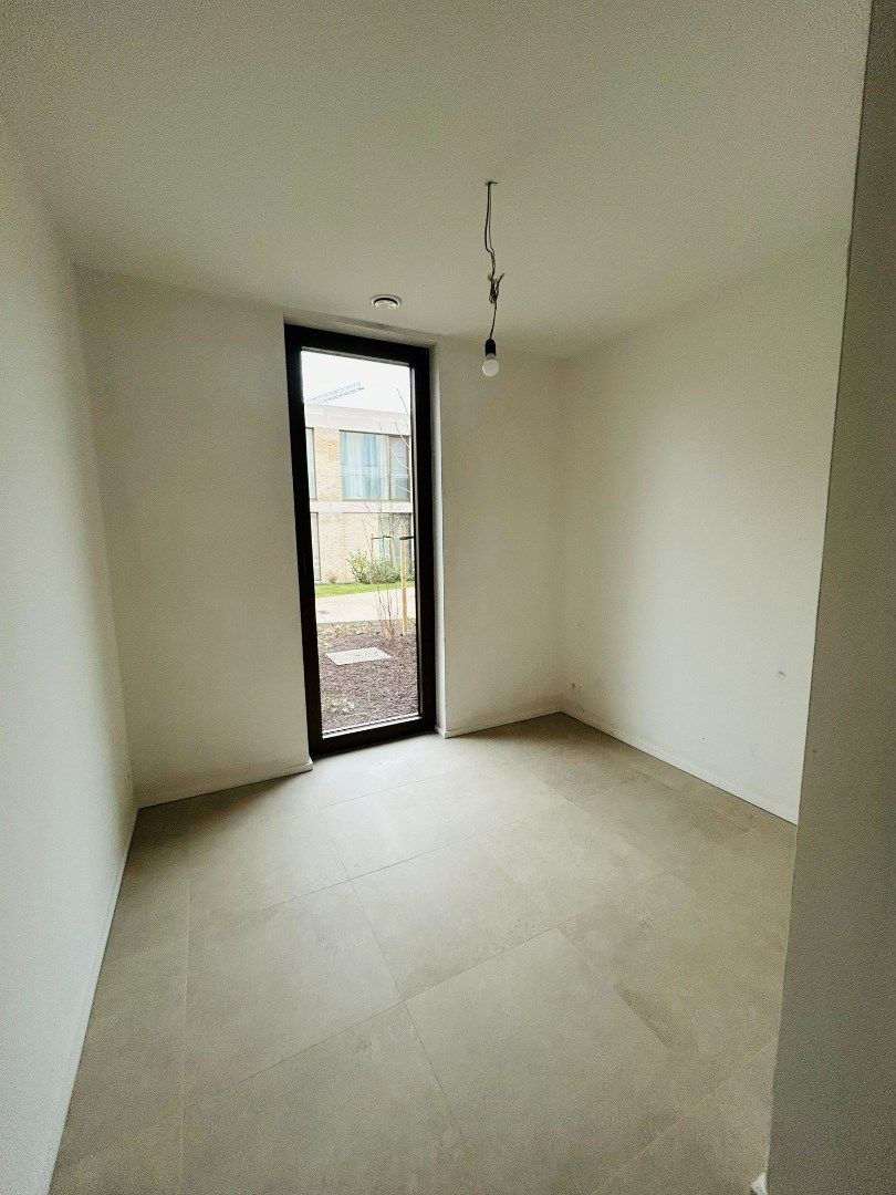 Nieuwbouw-gelijkvloers appartement met groot terras foto 13