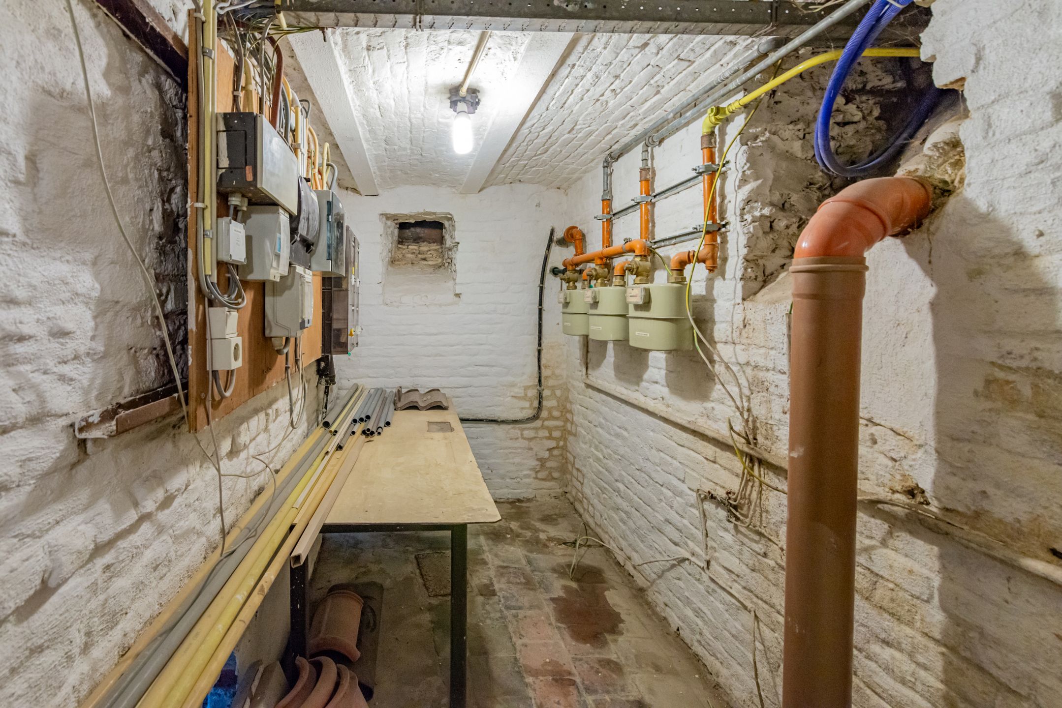 Gebouw met 3 appartementen en opslag te koop foto 31