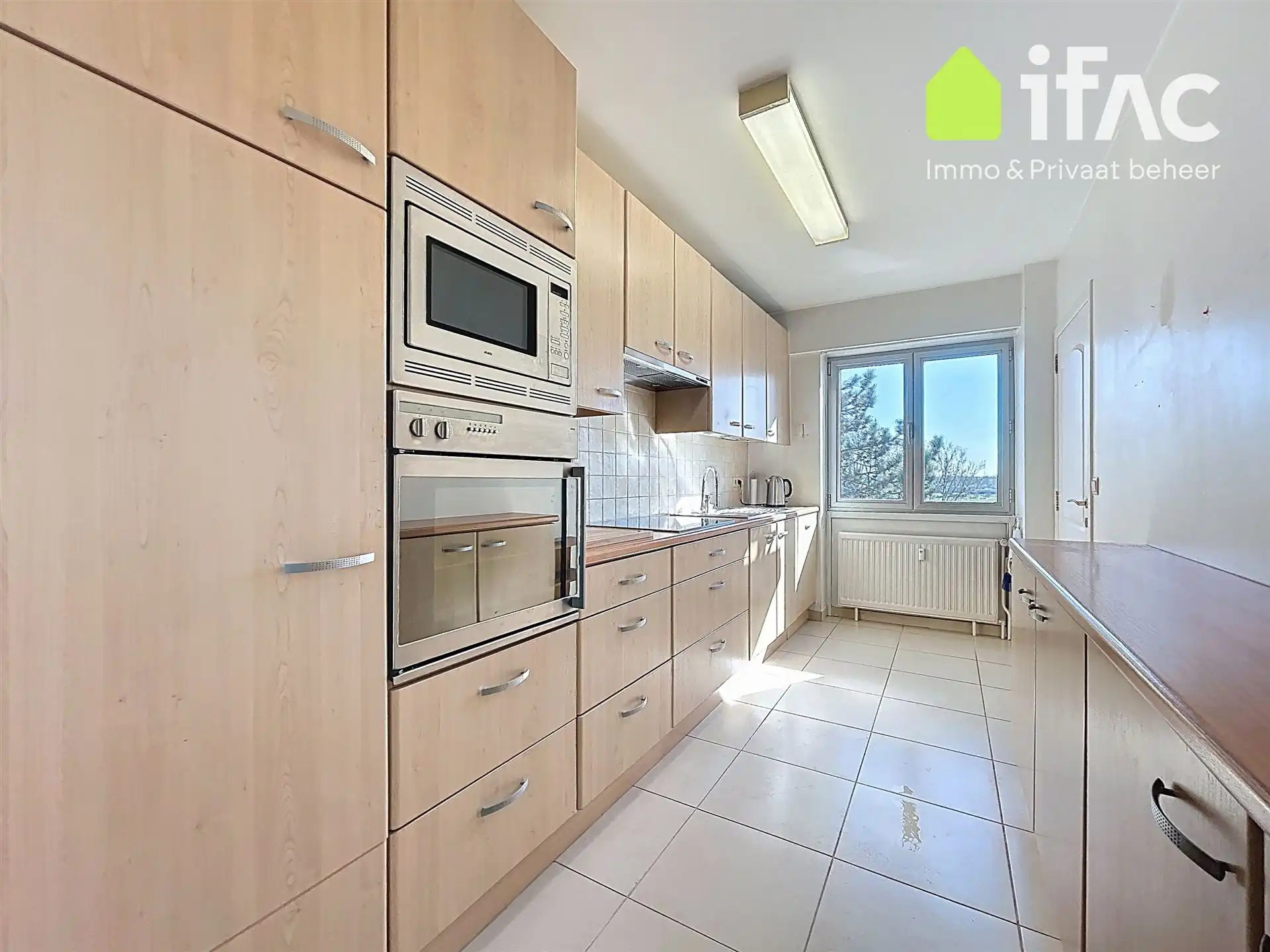 Ruim appartement met 3 slaap-, 2 badkamers en garagebox  foto 11