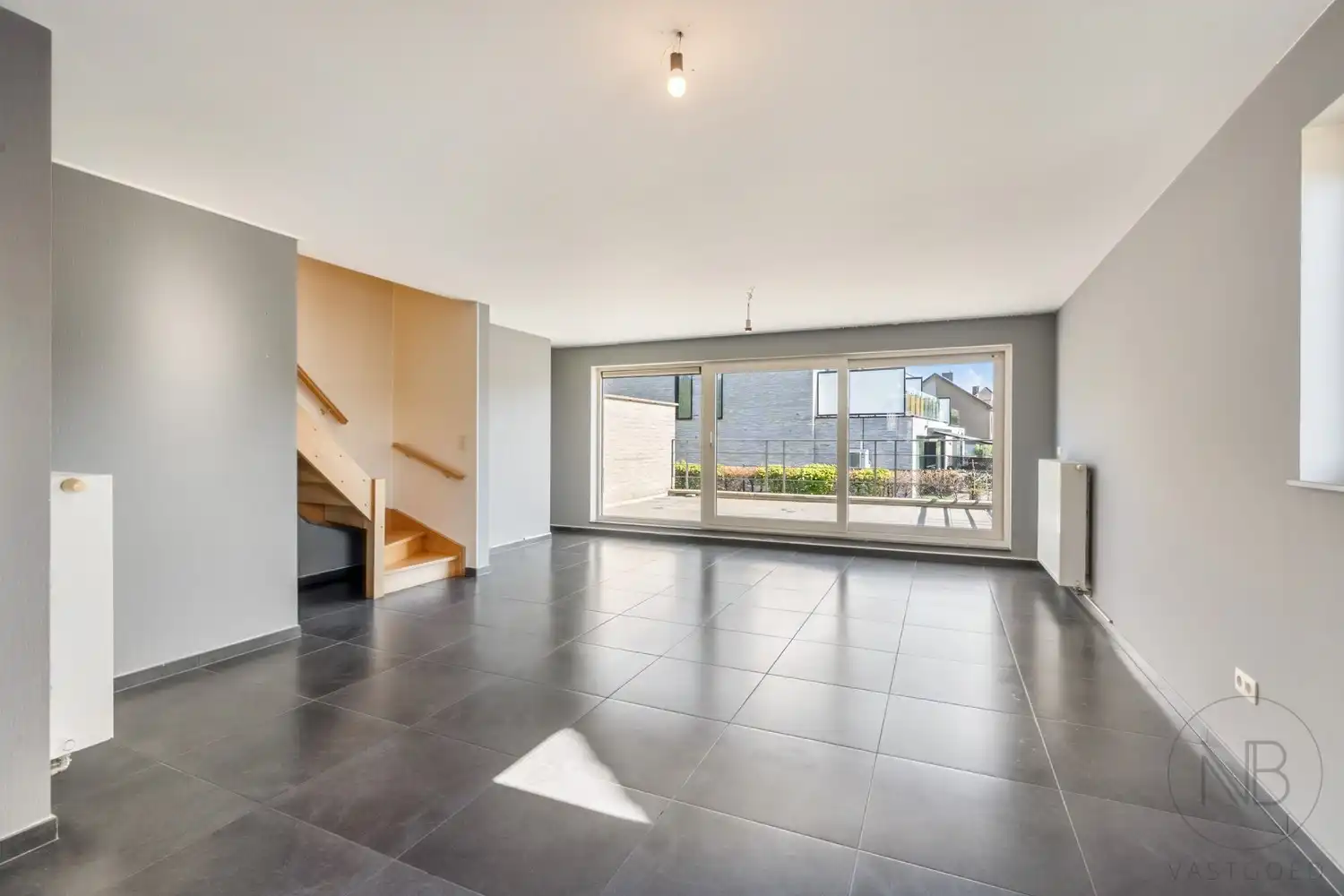 Ruim duplex appartement met 3 slaapkamers en groot terras in hartje Zutendaal foto 9