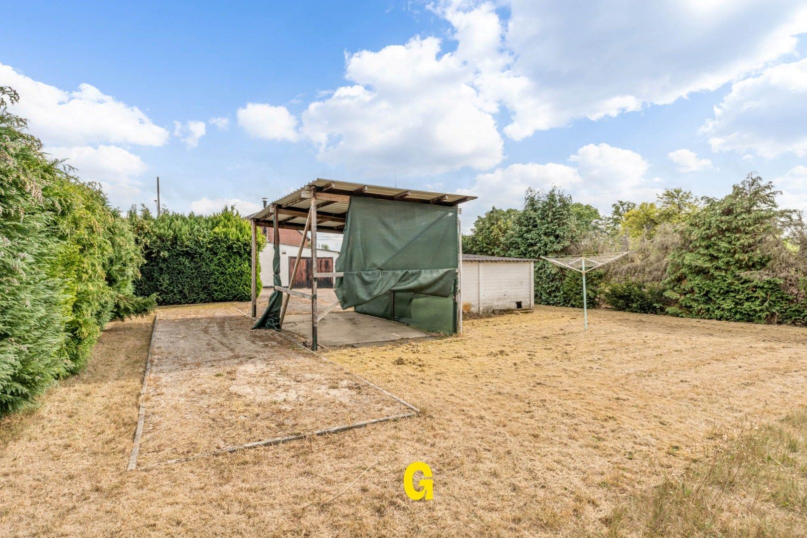 Te renoveren vrijstaande bungalow woning met tuin op een perceel van 8a 55ca foto 24