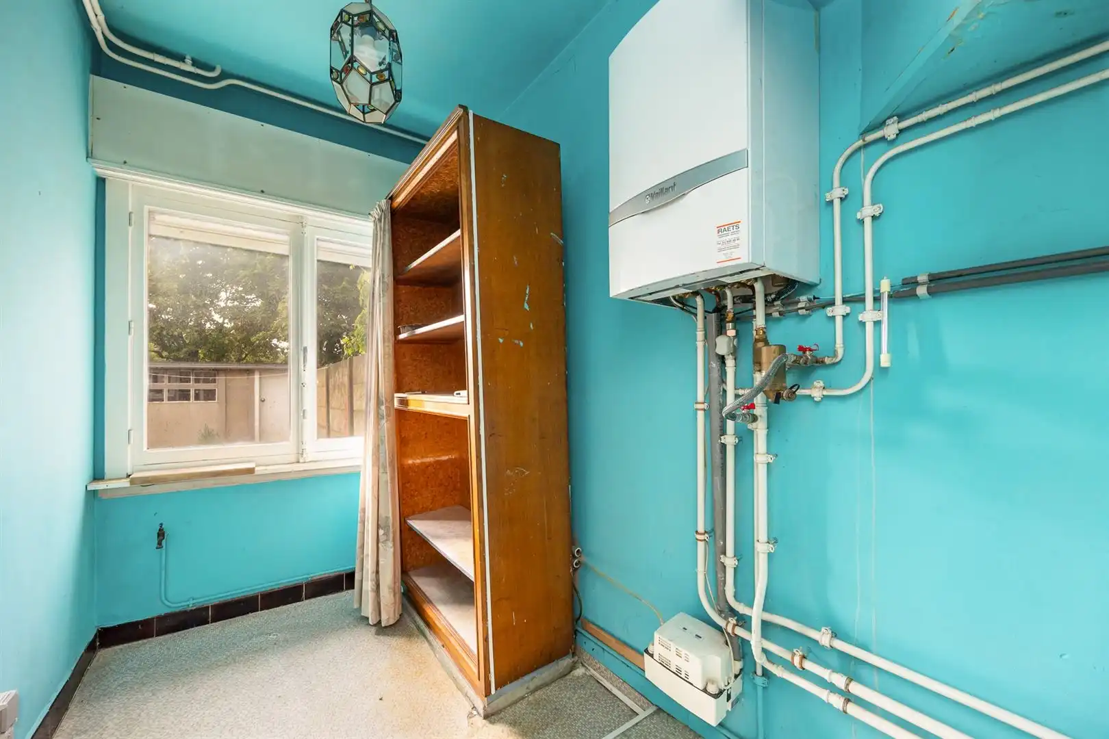Praktische woning met tuin en garage foto 3