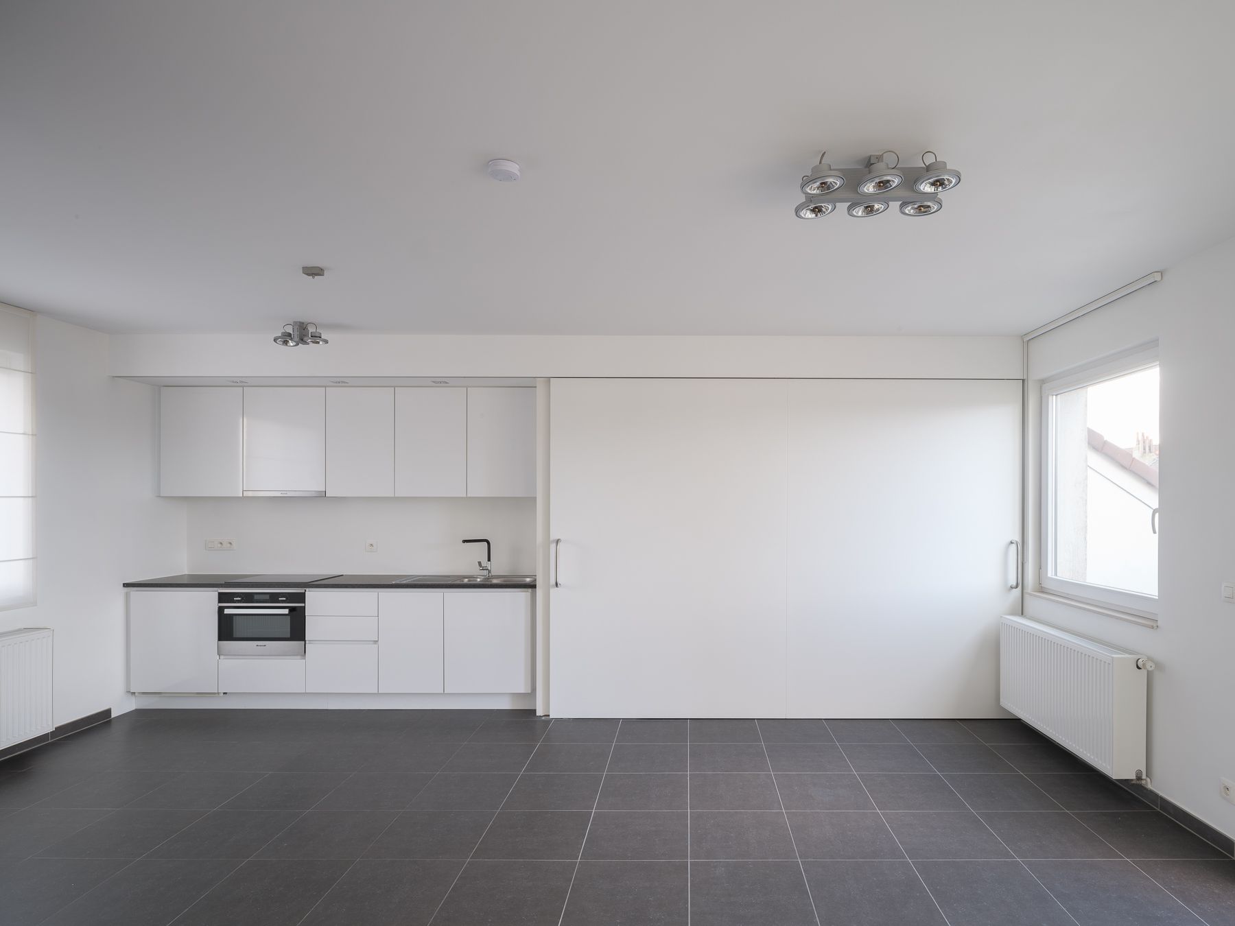 Instapklaar éénslaapkamerappartement met terras en autostaanplaats foto 4