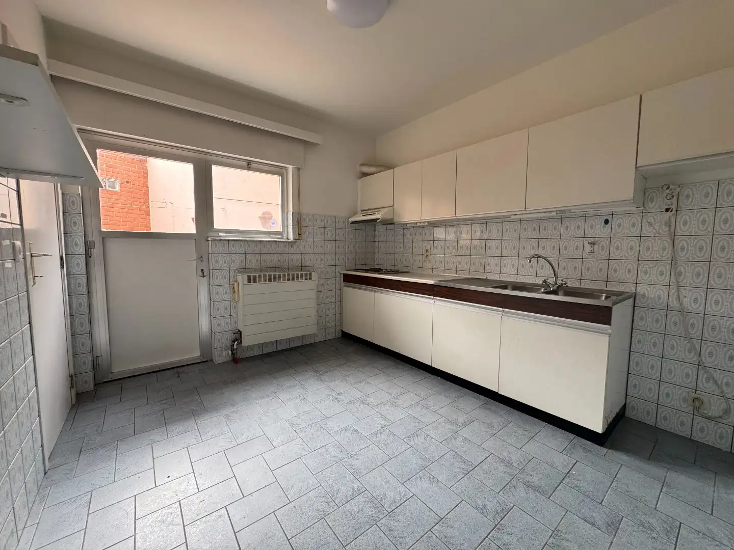 TE HUUR - Gelijkvloers appartement met 1 slpk en terras foto 10