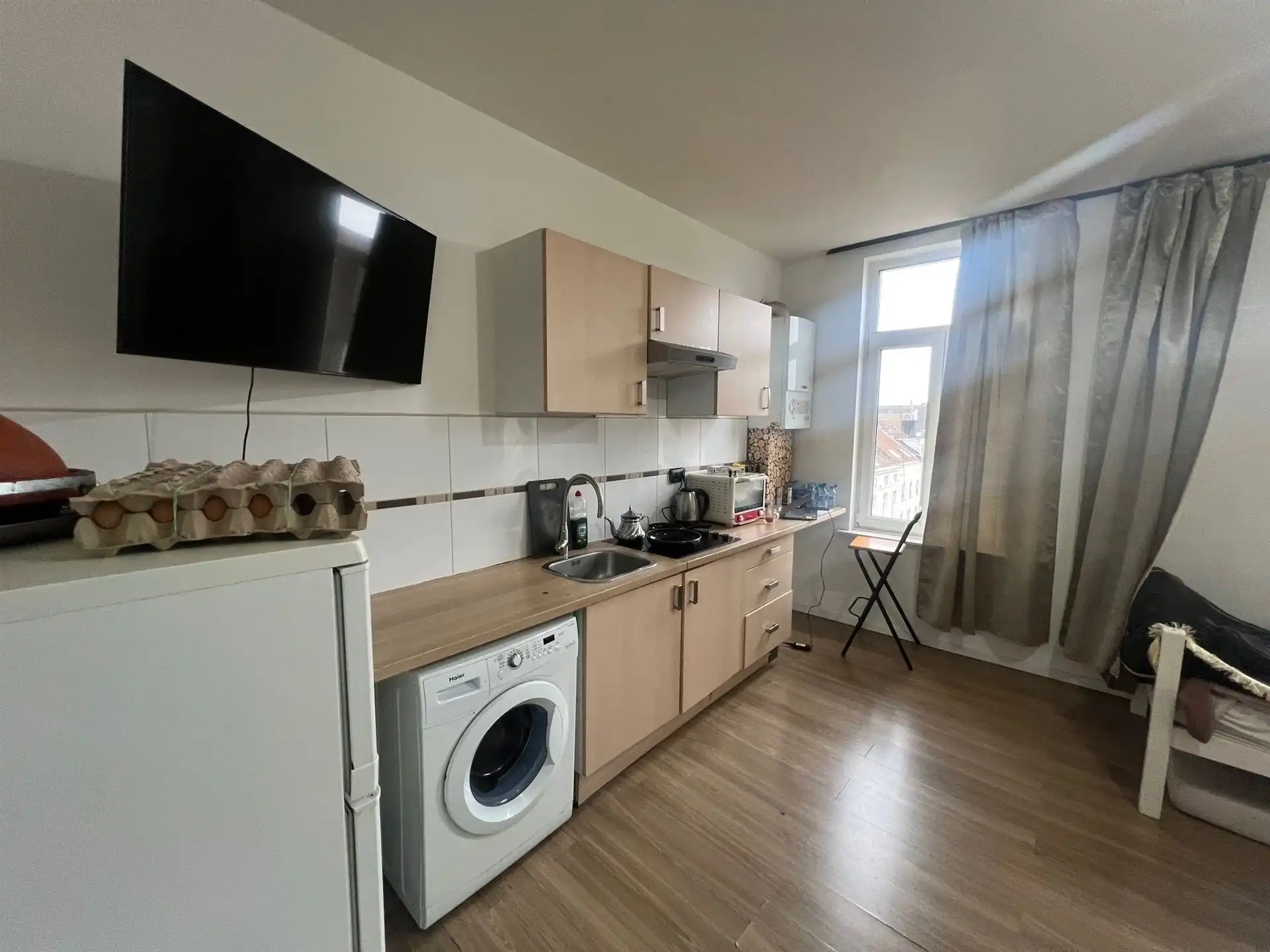 Opbrengsteigendom met commerciële gelijkvloers en 6 appartementen foto 16