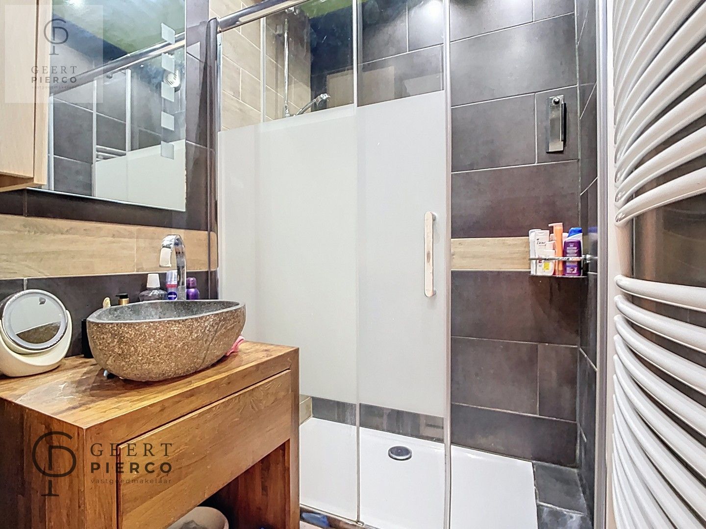 Gerenoveerd appartement met twee slaapkamers, ruim terras en ondergrondse staanplaats aan de stadsrand van Tienen. foto 11