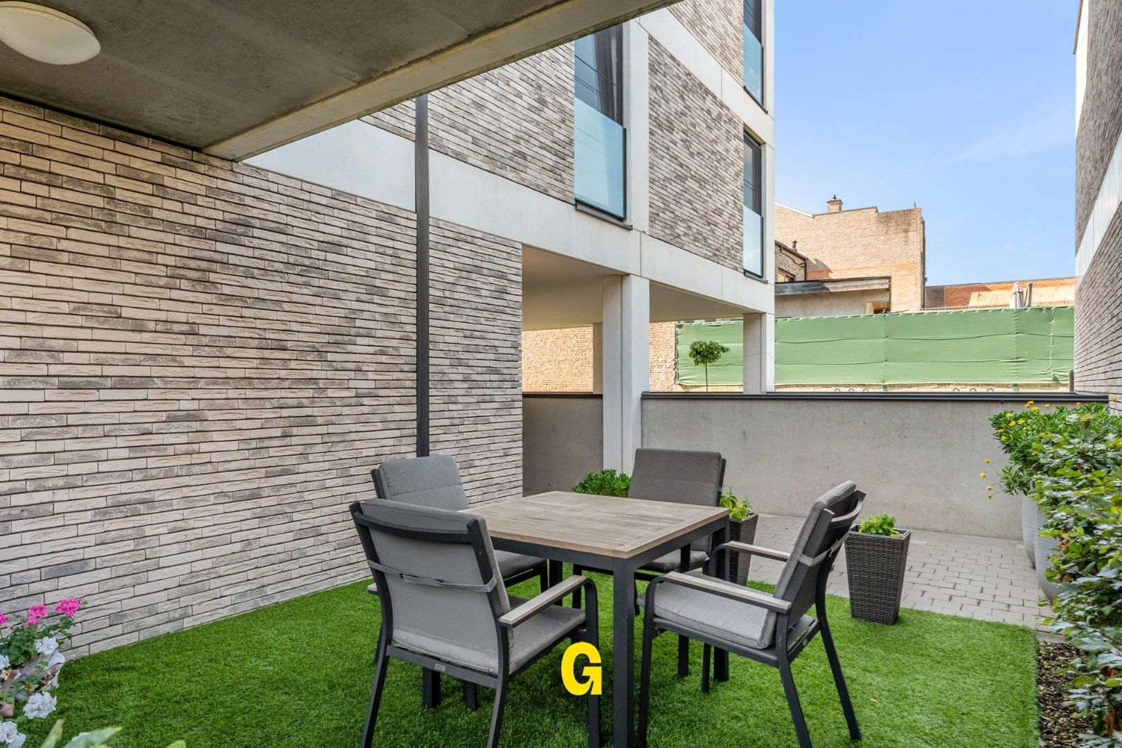 Gelijkvloersappartement met 1 slaapkamer, terras met tuintje, standplaats en berging in residentie Het Gruunhof - EPC label A foto 18