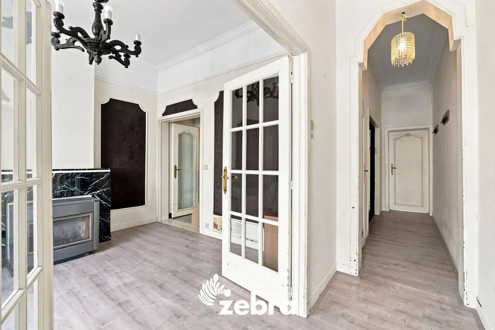 Op te frissen woning met 4 slaapkamers en ruime tuin met uitweg te Tielt! foto 4