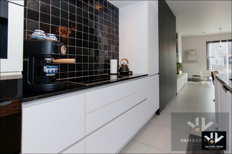 Instapklare, recente en energiezuinige woning met 3 slpk en volledig omheinde tuin foto 9