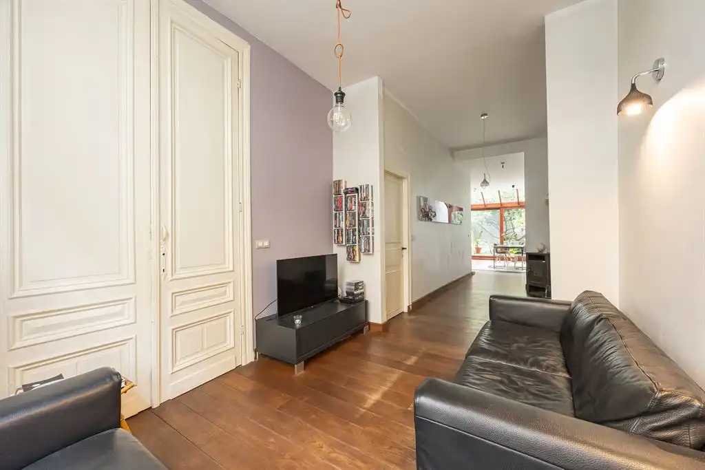 Karaktervolle gezinswoning met  groene stadstuin foto 8