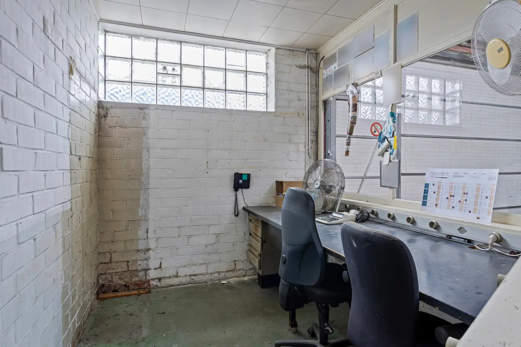 Solide eigendom: commerciële ruimte met atelier + 2 appart. foto 9