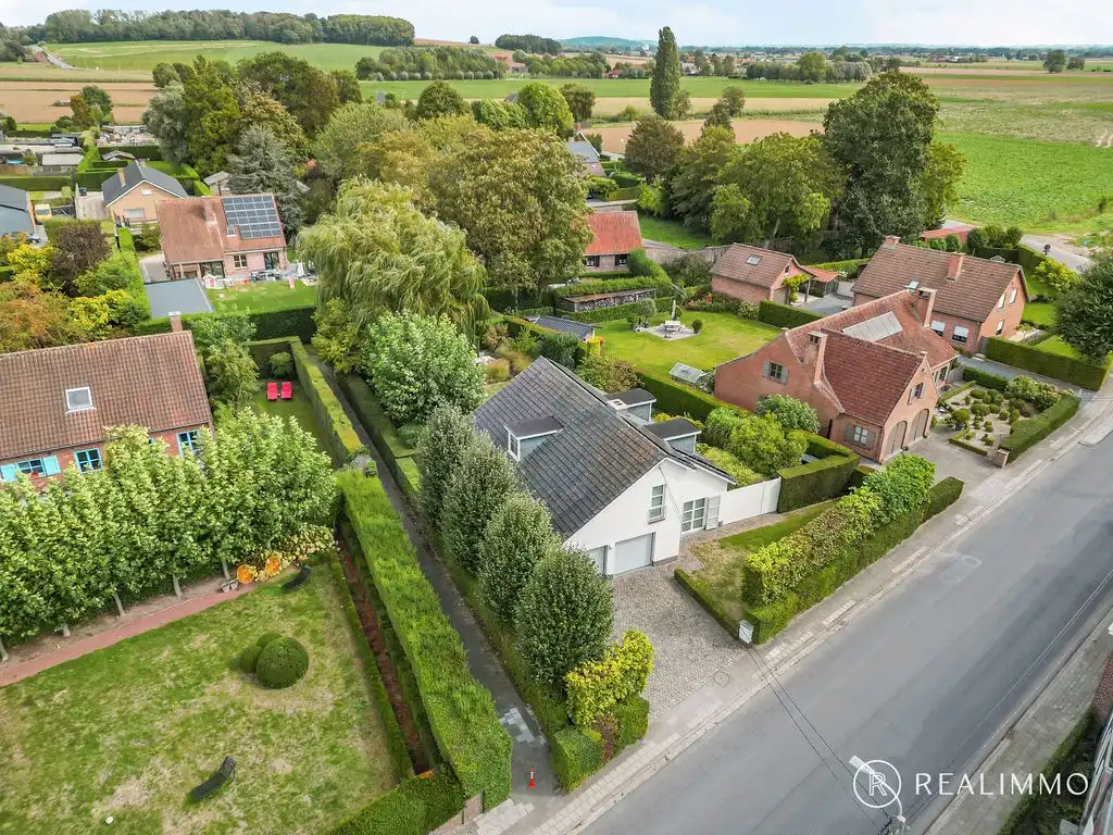 Ruime alleenstaande woning met prachtige tuin in Kooigem foto 22