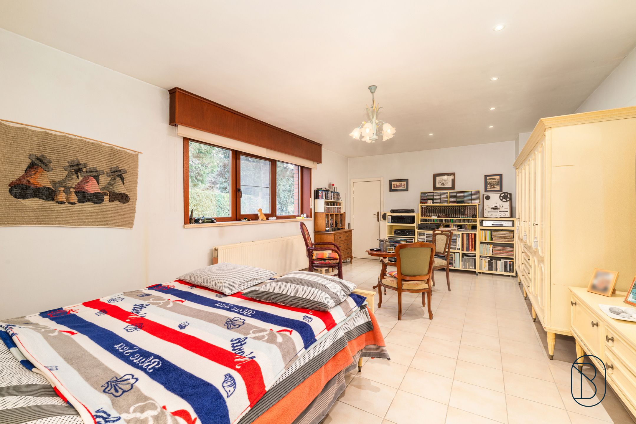 Topgelegen opbrengsteigendom met garage en grote tuin foto 11