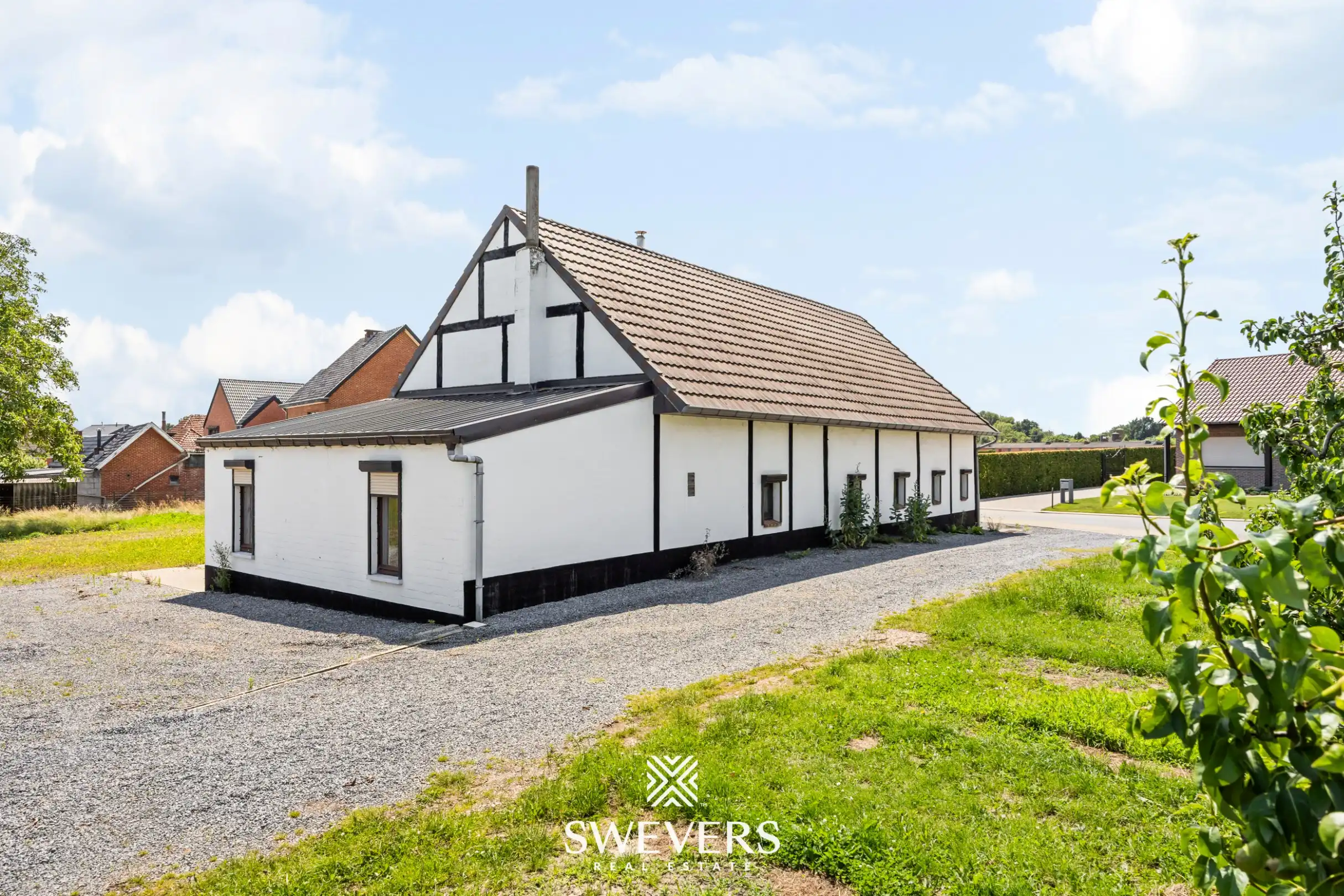 Vrijstaande woning met groot perceel en enorm renovatiepotentieel in Herk-de-Stad foto 9