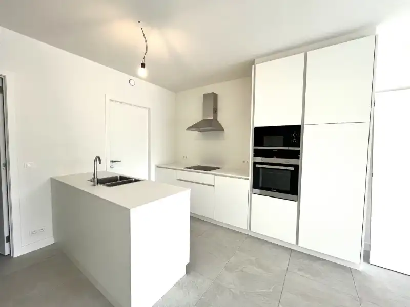 Energiezuinig 2 slpkm appartement met terras, tuin en staanplaats foto 7