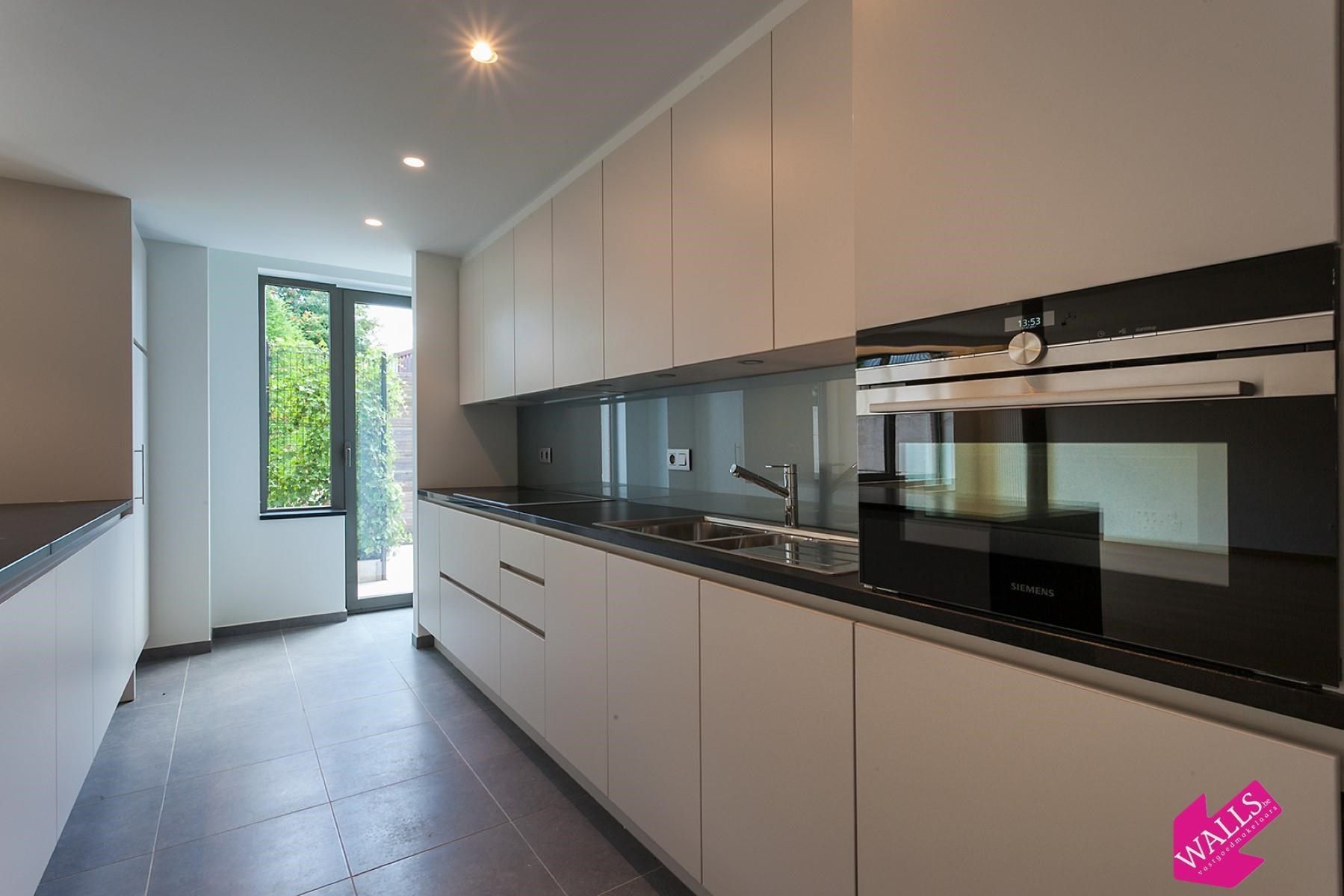 Gelijkvloers appartement met terras foto 6