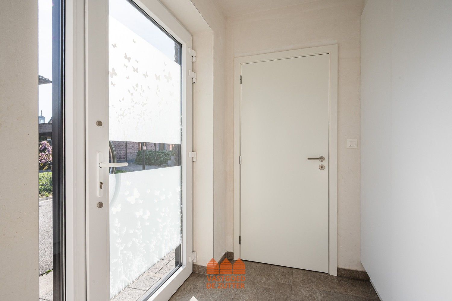 Ruime en energiezuinige woning in een rustige woonwijk te Sint-Laureins foto 2