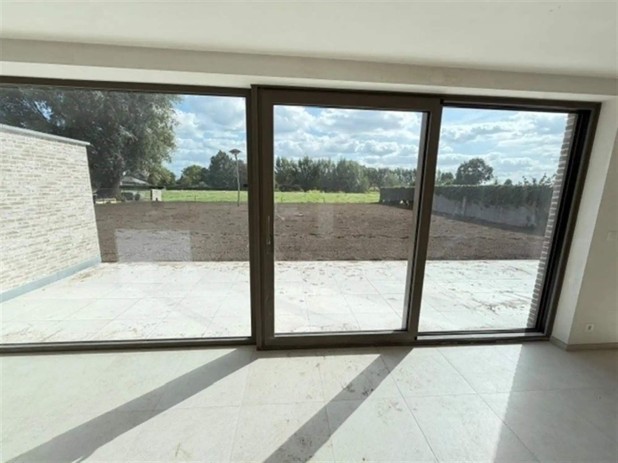 Nieuwbouwappartement met grote tuin en zonneterras foto 6