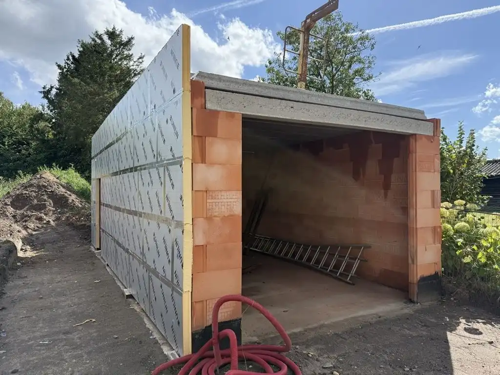Moderne nieuwbouwwoning met vrijstaande garage en kelder, casco afgewerkt foto 7