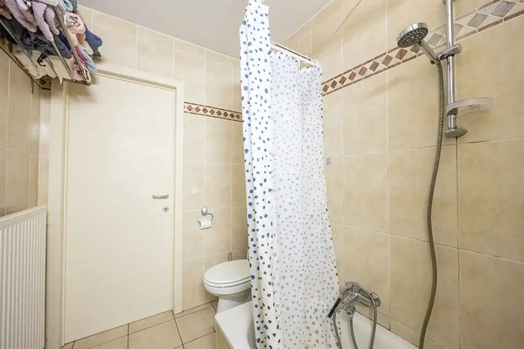 Gelijkvloers appartement met privatieve tuin! foto 12