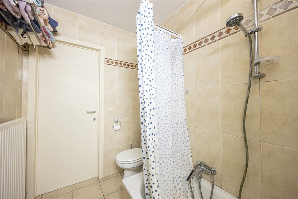 Gelijkvloers appartement met privatieve tuin! foto 12